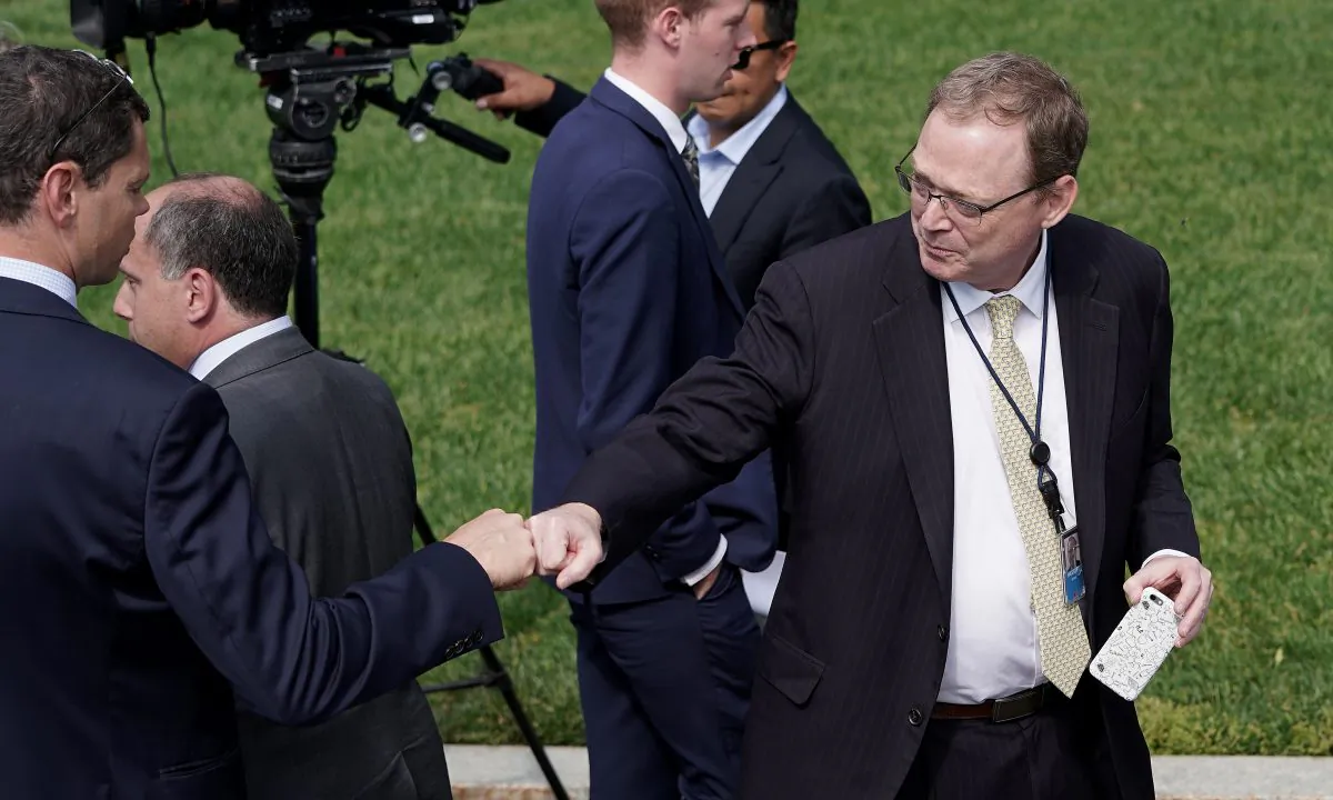 Chairman of the Council of Economic Advisers Kevin Hassett fist-bumps reporters outside the White House on May 03, 2019, in Washington. Hassett answered questions about Friday's positive jobs numbers, where the U.S. economy added 263,000 jobs and the unemployment rate fell to 3.6% in April.  Chip Somodevilla/Getty Images