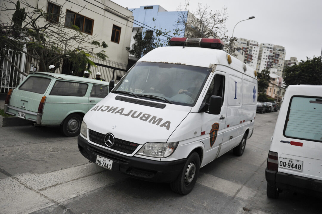 An ambulance arrives at a hospital in Lima, Peru, in a file photo. (Ernesto Benavides/AFP/Getty Images)
