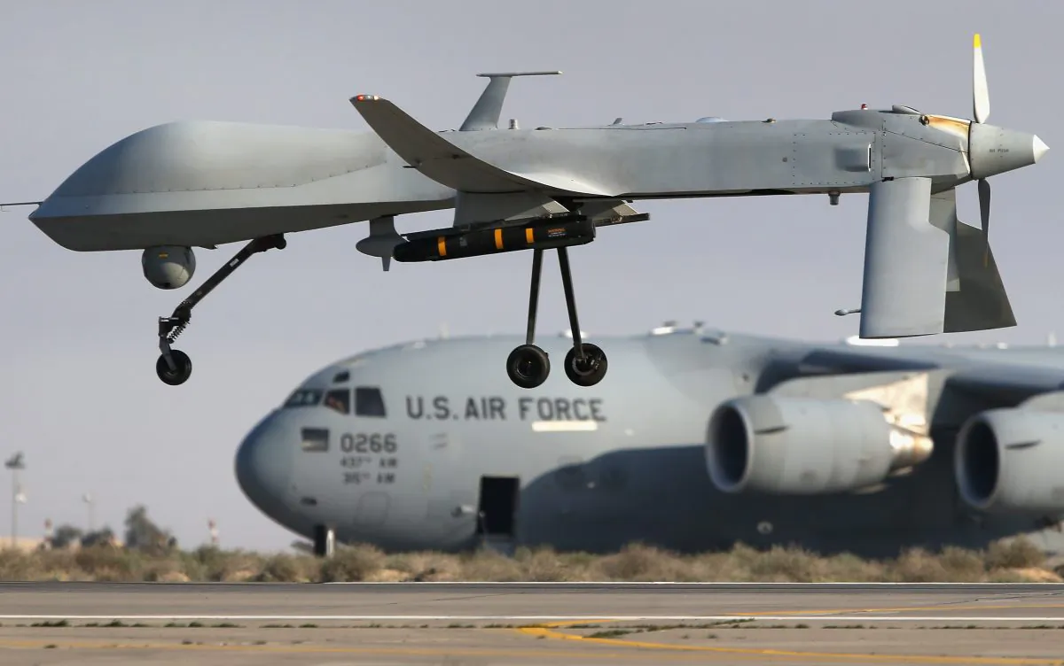 A U.S. Air Force MQ-1B Predator unmanned aerial vehicle carrying a Hellfire air-to-surface missile lands at a secret air base in the Persian Gulf region on Jan. 7, 2016. (John Moore/Getty Images)