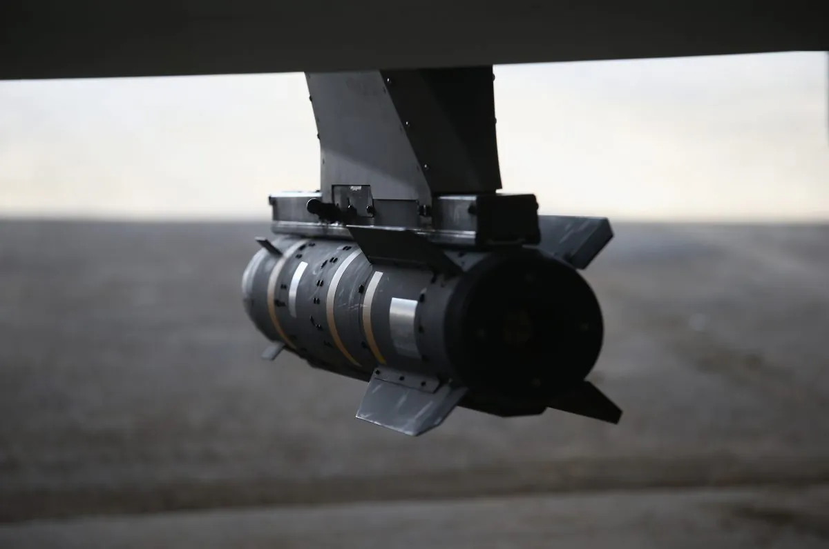 A Hellfire missile hangs from a U.S. Air Force MQ-1B Predator unmanned aerial vehicle (UAV), at a secret air base in the Persian Gulf region on Jan. 7, 2016. (John Moore/Getty Images)