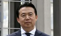 Former Interpol Chief Admits Guilt in Chinese Court Hearing