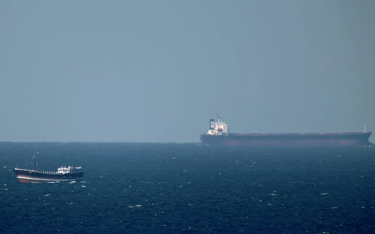 An oil tanker cruises towards the Strait of Hormuz off the shores of Khasab in Oman on Jan. 15, 2011. (Marwan Naamani/AFP/Getty Images)