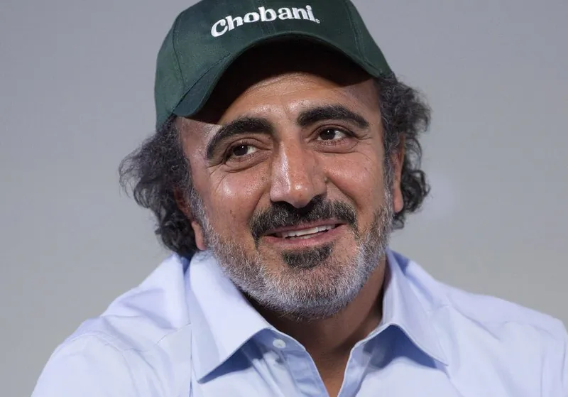 Hamdi Ulukaya, founder, chairman and CEO of Chobani, speaks at the National Retail Federation conference in N.Y., on Jan. 16, 2018. (Mark Lennihan/File Photo via AP)