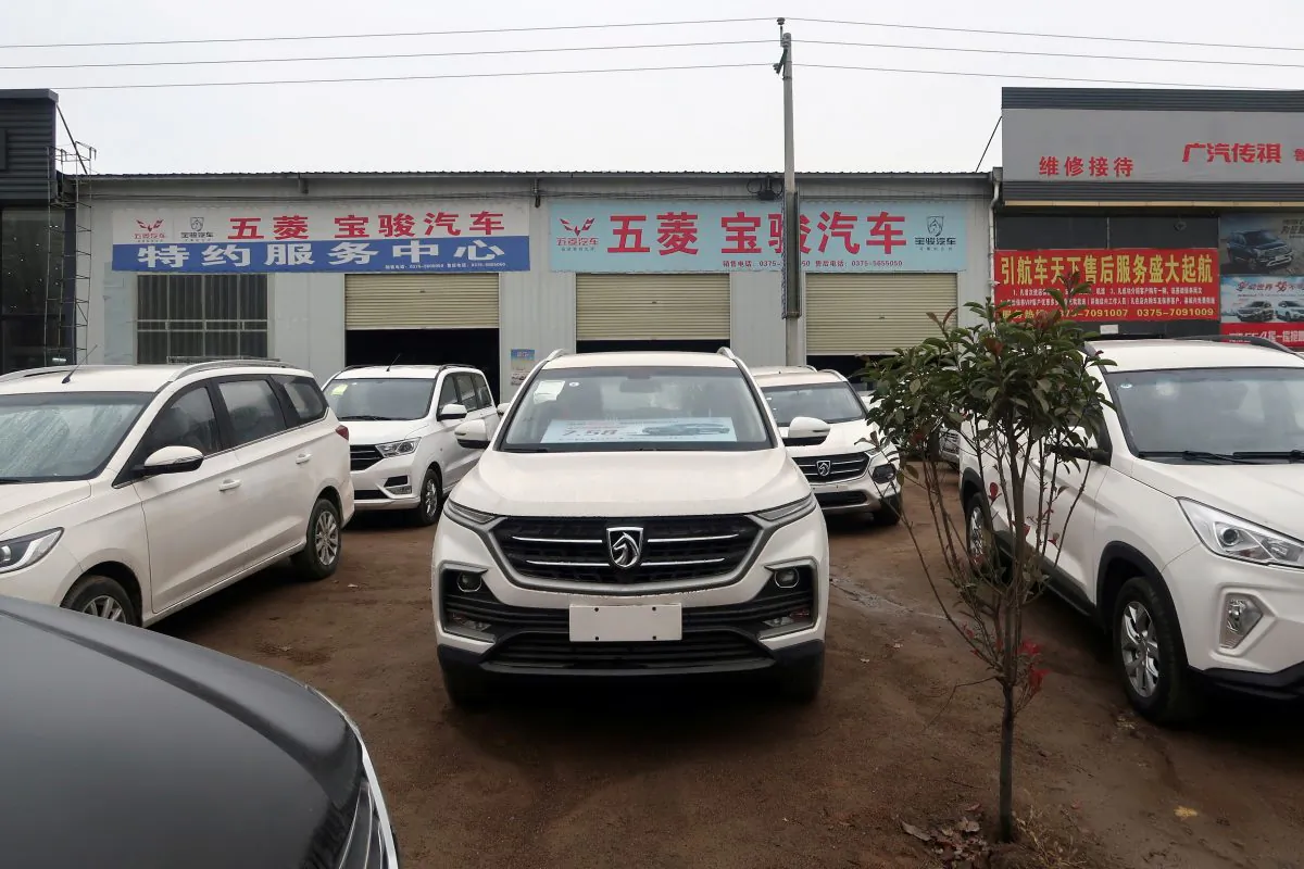 Baojun cars wait for sale in front of a dealership in Lushan County, Henan Province, China on Nov. 16, 2018. (Yilei Sun/Reuters)