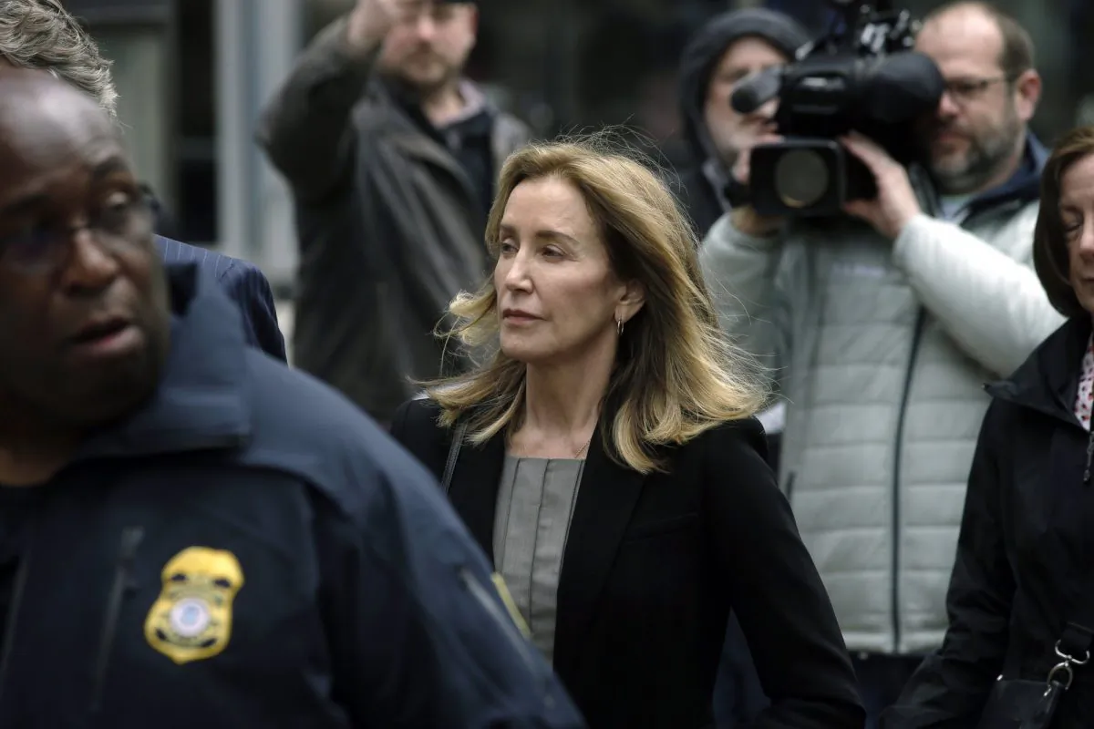 Felicity Huffman arrives at federal court in Boston, where she was scheduled to plead guilty to charges in a nationwide college admissions bribery scandal, on May 13, 2019. (Steven Senne/AP Photo)