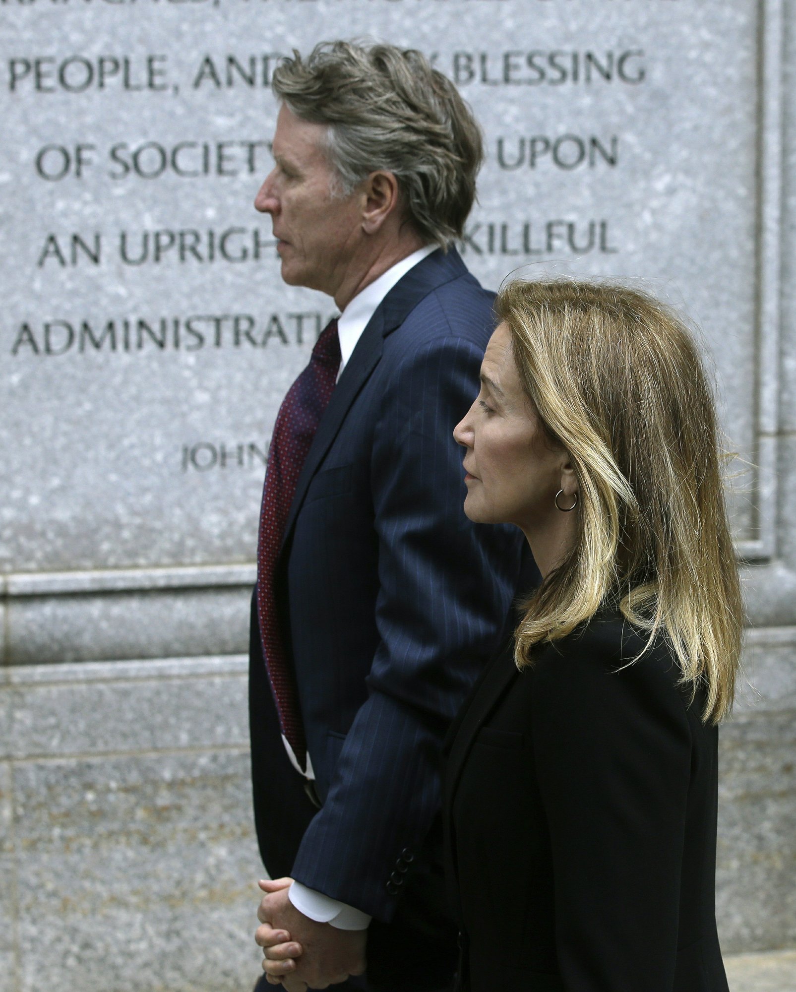 Felicity Huffman arrives with her brother