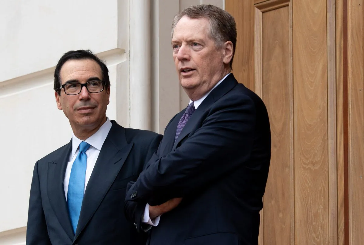 U.S. Trade Representative Robert Lighthizer (R) and U.S. Treasury Secretary Steven Mnuchin (L) await the arrival of Chinese Vice Premier Liu He at the Office of the U.S. Trade Representative for trade negotiations in Washington on May 10, 2019. SAUL LOEB/AFP/Getty Images