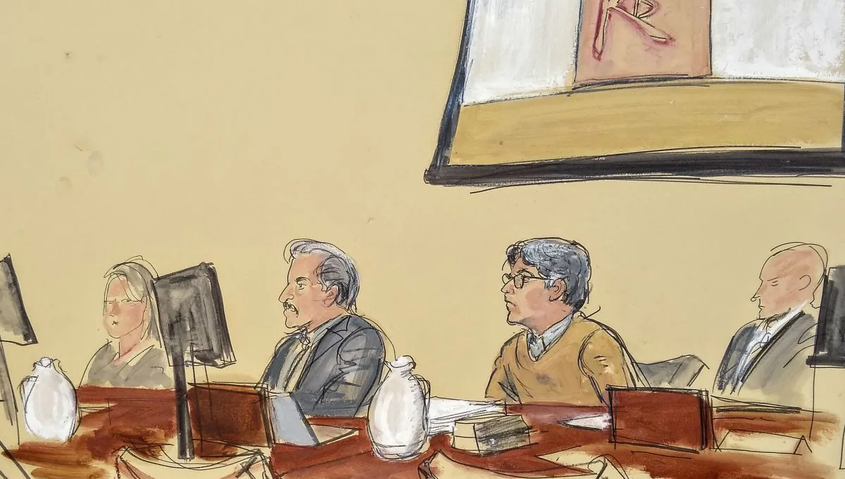 In this courtroom artist's sketch, Keith Raniere, second from right, leader of the secretive group NXIVM, attends his trial in Brooklyn federal court in New York on May 7, 2019.  (Elizabeth Williams via AP)