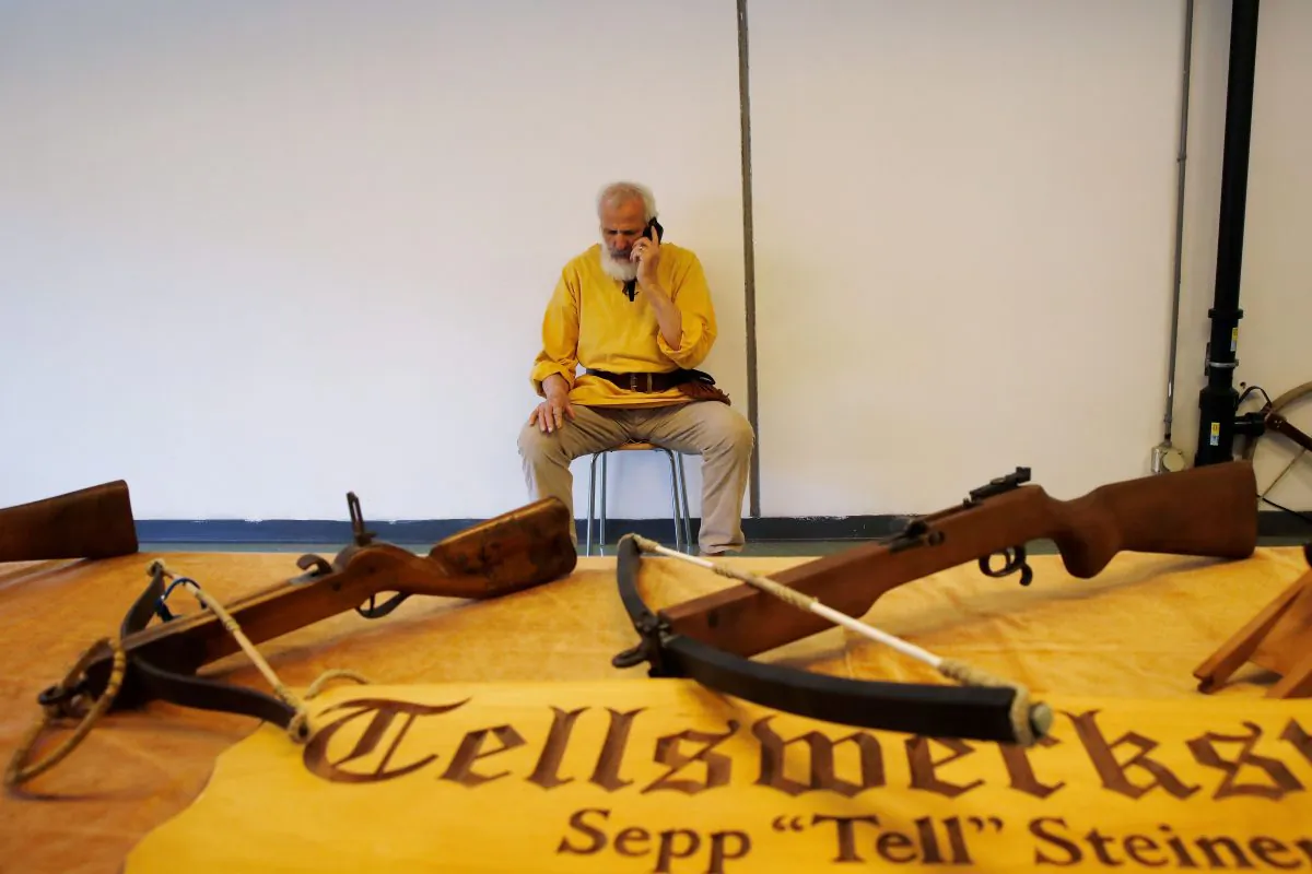 A crossbow exhibitor dressed Swiss Hero William Tell at the Arms Trade Fair in Lucerne, Switzerland, on March 29, 2019. (Stefan Wermuth/AFP/Getty Images)