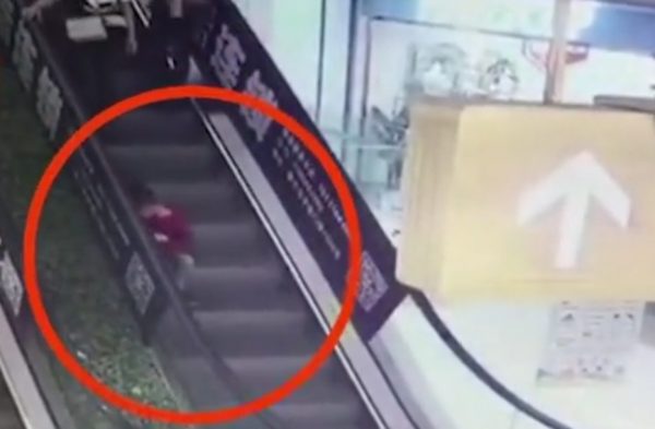 Boy finger escalator