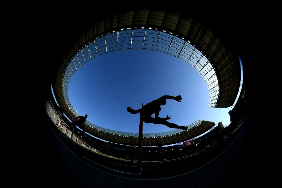 A hurdler competes at the Olympiastadion in Berlin on Aug. 6, 2018. (Matthias Hangst/Getty Images)