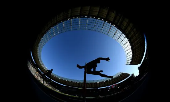 College Hurdler Goes the ‘Full Superman’ to Clinch Title