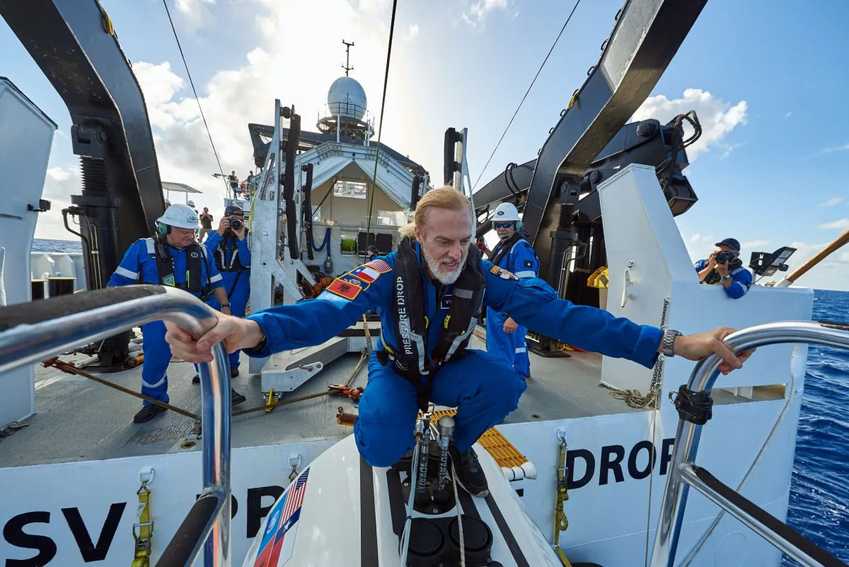 Explorer Victor Vescovo stands atop the Limiting Factor submersible craft, which he used to dive to the deepest point of the Challenger Deep in the Mariana Trench on April 28, 2019. (Reeve Jolliffe/Five Deeps)