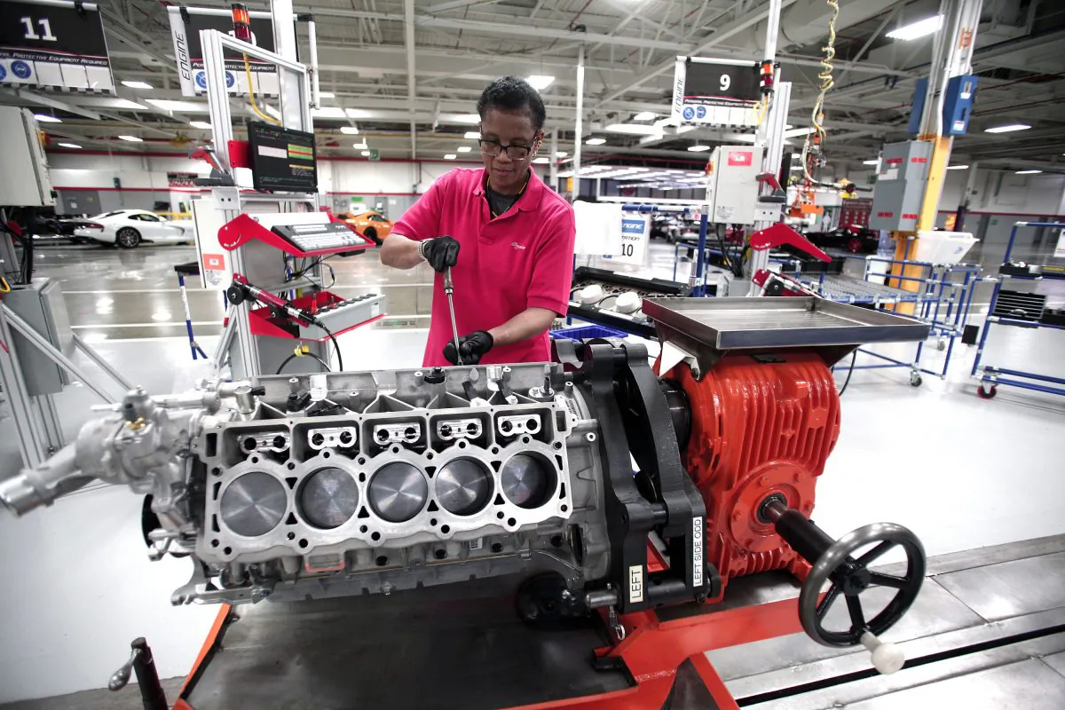 Angella Richberg works on an engine for a Dodge Viper at the Viper Assembly Plant in Detroit, Mich., on May 8, 2015. (Bill Pugliano/Getty Images)