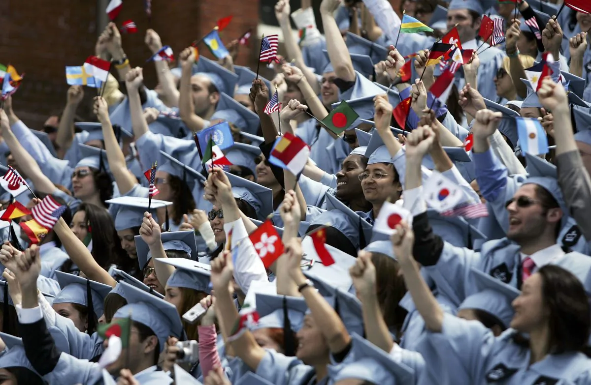 Students cheer during commencement ceremonies at Columbia University May 18, 2005 in New York City. This is the 251st class to graduate from Columbia. Spencer Platt/Getty Images