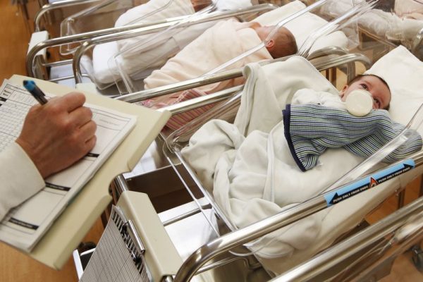 Newborn babies in nursery