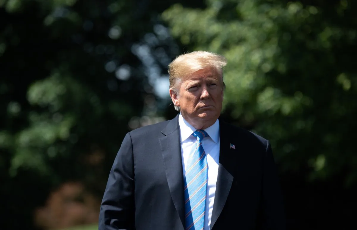 President Donald Trump walks to speak to the media prior to departing on Marine One from the South Lawn of the White House in Washington, DC, on May 14, 2019. Trump was traveling to Louisiana to speak about energy, infrastructure and economic growth and to attend a fundraiser. (Saul Loeb/AFP/Getty Images)