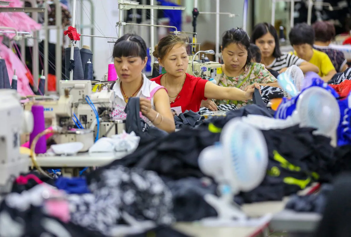 Workers at a swimwear factory in Jinjiang, Fujian Province, China, on Aug. 2, 2018. (STR/AFP/Getty Images)
