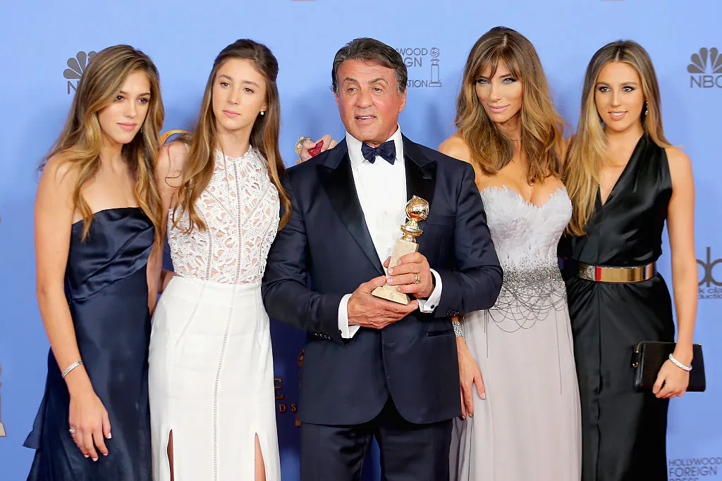 Actor Sylvester Stallone (C), winner of Best Supporting Performance in a Motion Picture for "Creed," poses in the press room with wife Jennifer Flavin (2nd R) and daughters Sistine, Sophia and Scarlet during the 73rd Annual Golden Globe Awards held at the Beverly Hilton Hotel in Beverly Hills, Calif., on Jan. 10, 2016. (Mark Davis/Getty Images)