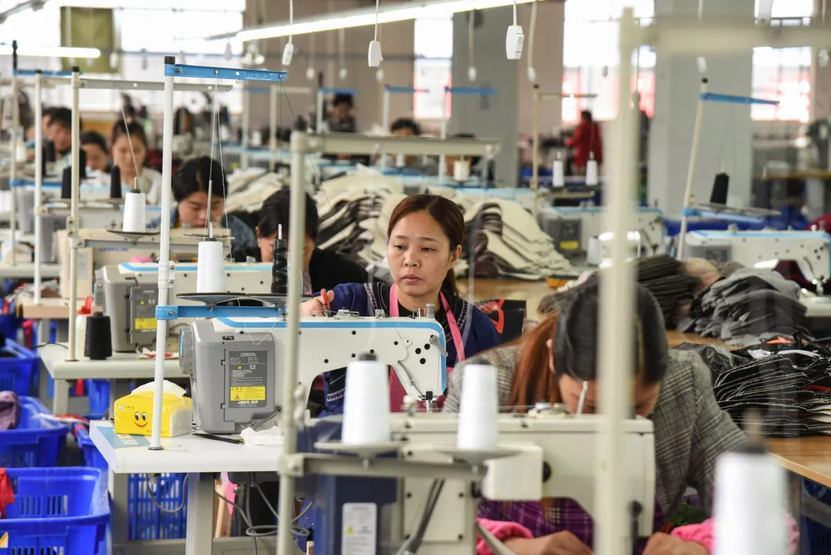 Employees in a textile factory in Rongjiang, China. (STR/AFP/Getty Images)