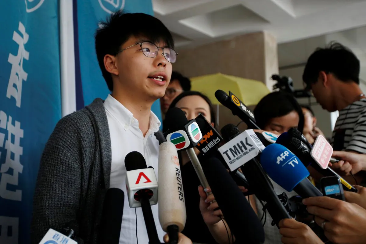 Hong Kong's pro-democracy activist Joshua Wong speaks to members of the media at the High Court in Hong Kong, China, on May 16, 2019. (James Pomfret/Reuters)