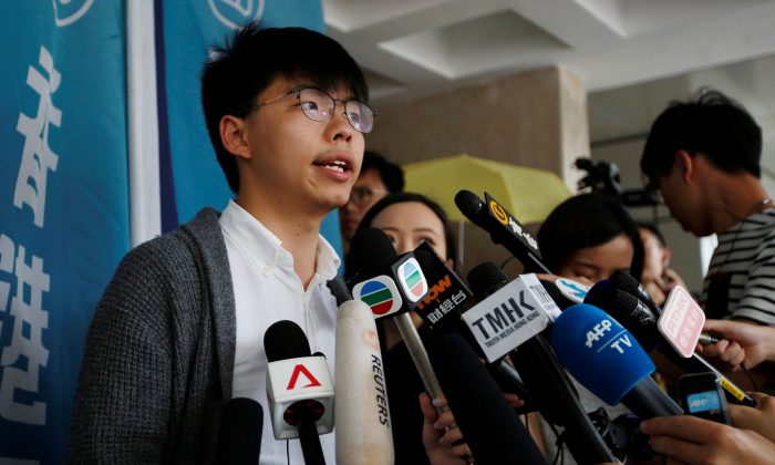 Hong Kong's pro-democracy activist Joshua Wong speaks to members of the media at the High Court in Hong Kong, China, on May 16, 2019. (James Pomfret/Reuters)