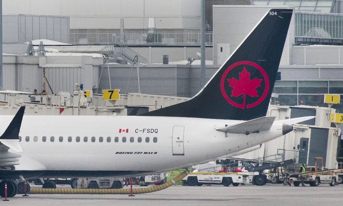 An Air Canada Boeing 737 Max 8 aircraft is shown at Trudeau Airport in Montreal, March 13, 2019. Air Canada and Air Transat announced May 17, 2019, that they are in negotiations for Air Canada's acquisition of Air Transat. (The Canadian Press/Graham Hughes)