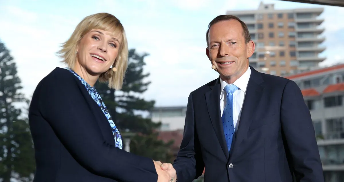 Federal Member for Warringah Elect Zali Steggall (L) and former Prime Minister and outgoing Member Tony Abbott participate in the Sky News/Manly Daily Debate at Queenscliff Surf Club in Sydney, Australia, on May 2, 2019. (Damian Shaw/News Corp Australia via Getty Images)