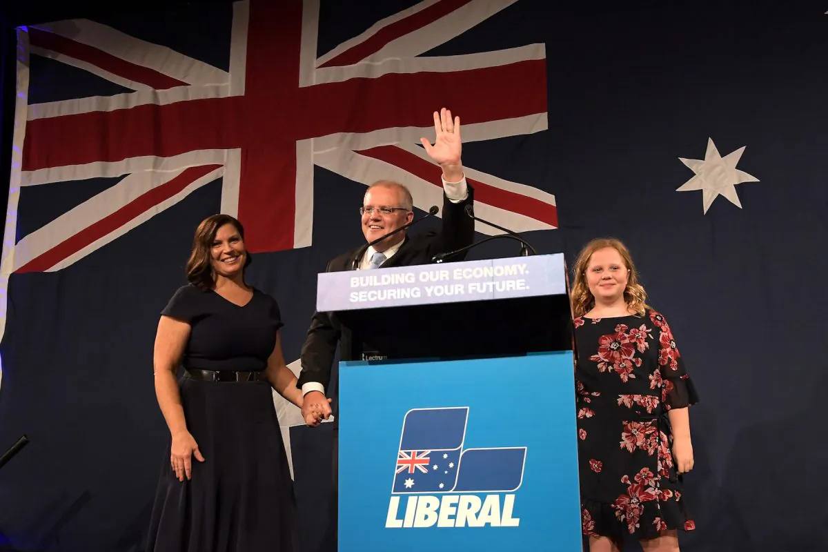 Prime Minister of Australia and leader of the Liberal Party Scott Morrison, flanked by his wife Jenny Morrison and daughters Lily Morrison and Abbey Morrison, delivers his victory speech at the Sofitel Sydney Wentworth in Sydney, Australia on May 18, 2019. Prime Minister Scott Morrison was re-elected today, securing another three-year team for the Liberal-National coalition following an intense five-week campaign against Bill Shorten and the Labor party. (Tracey Nearmy/Getty Images)