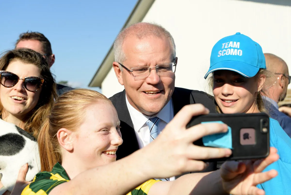 Prime Minister of Australia and leader of the Liberal Party Scott Morrison, flanked by his wife Jenny Morrison and daughters Lily Morrison and Abbey Morrison, delivers his victory speech at the Sofitel Sydney Wentworth in Sydney, Australia on May 18, 2019. Prime Minister Scott Morrison was re-elected today, securing another three-year team for the Liberal-National coalition following an intense five-week campaign against Bill Shorten and the Labor party. (Tracey Nearmy/Getty Images)