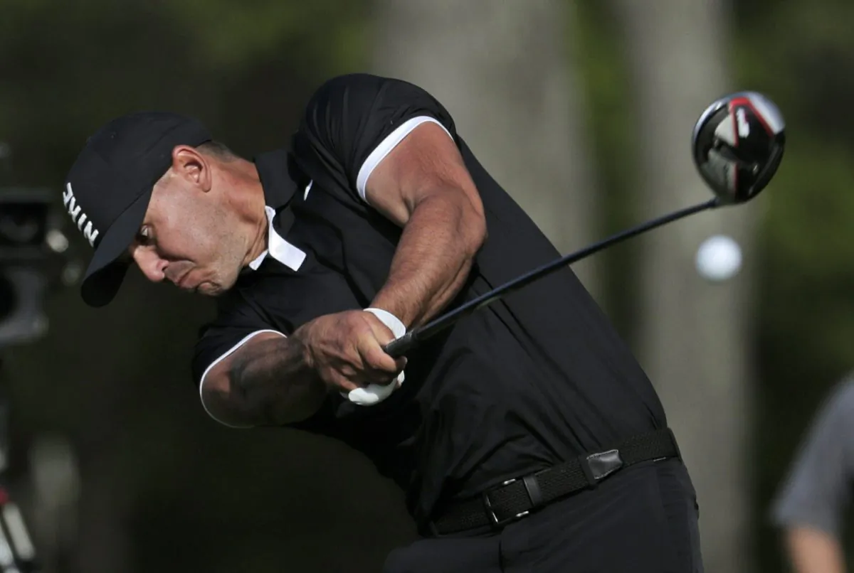 Brooks Koepka drives off the 12th tee during the third round of the PGA Championship golf tournament at Bethpage Black in Farmingdale, N.Y., on May 18, 2019. (Julio Cortez/Photo via AP)