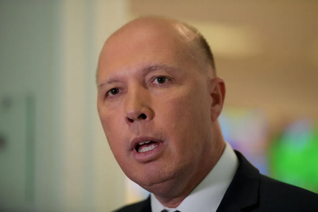 Australian Home Affairs Minister Peter Dutton speaks to media in the Press Gallery at Parliament House on Feb. 13, 2019 in Canberra, Australia. (Tracey Nearmy/Getty Images)