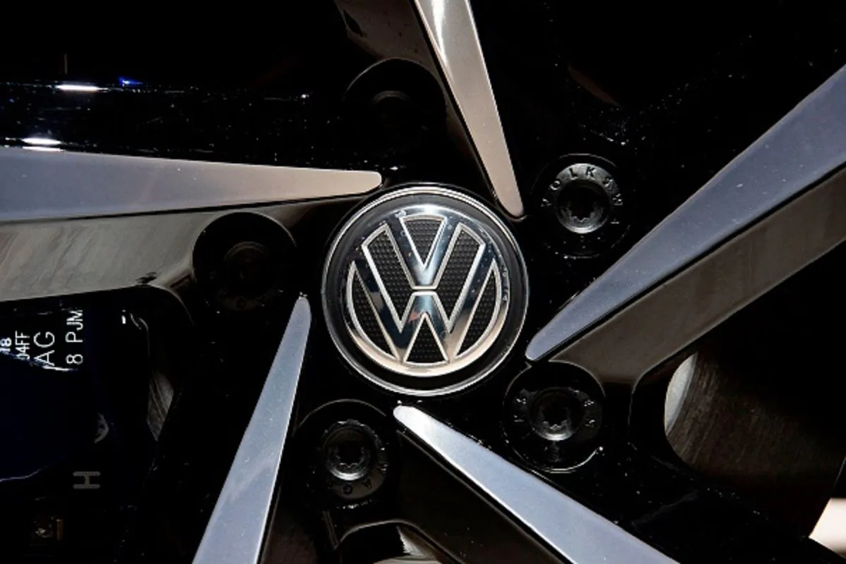 A Volkswagen logo appears on the wheel of a VW Passat GTE Variant on display at the annual general meeting of German car manufacturing giant Volkswagen in Berlin on May 14, 2019. (John Macdougall/AFP/Getty Images)      
