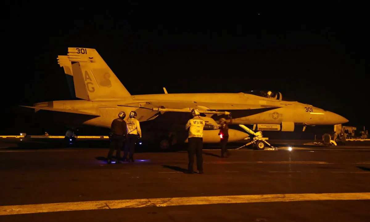 In this handout photo provided by the U.S. Navy, an F/A-18E Super Hornet gets ready to launch from the flight deck of the Nimitz-class aircraft carrier USS Abraham Lincoln in the Red Sea on May 10, 2019. (Mass Communication Specialist Seaman Michael Singley/U.S. Navy via Getty Images)