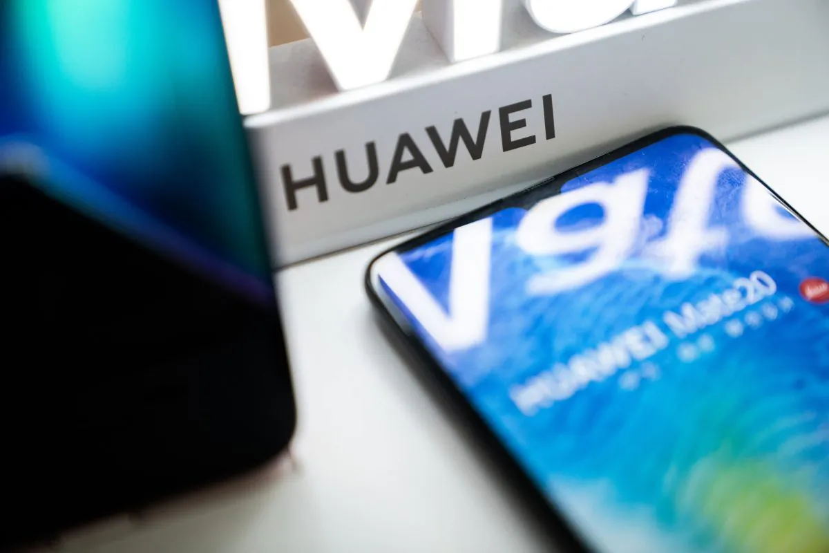 A Huawei logo is displayed at a retail store in Beijing on May 20, 2019. (FRED DUFOUR/AFP/Getty Images)
