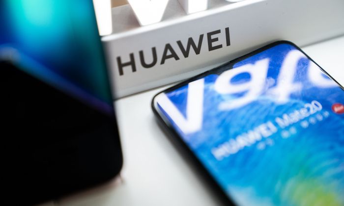 A Huawei logo is displayed at a retail store in Beijing on May 20, 2019. (FRED DUFOUR/AFP/Getty Images)