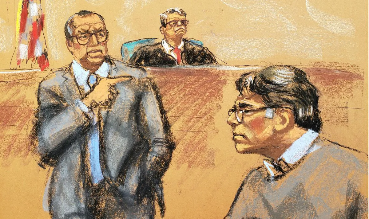Defense attorney Marc Agnifilo (L) points in the direction of Keith Raniere, in this courtroom sketch, at the Brooklyn Federal Courthouse in New York, on May 7, 2019. (Jane Rosenberg/Reuters)