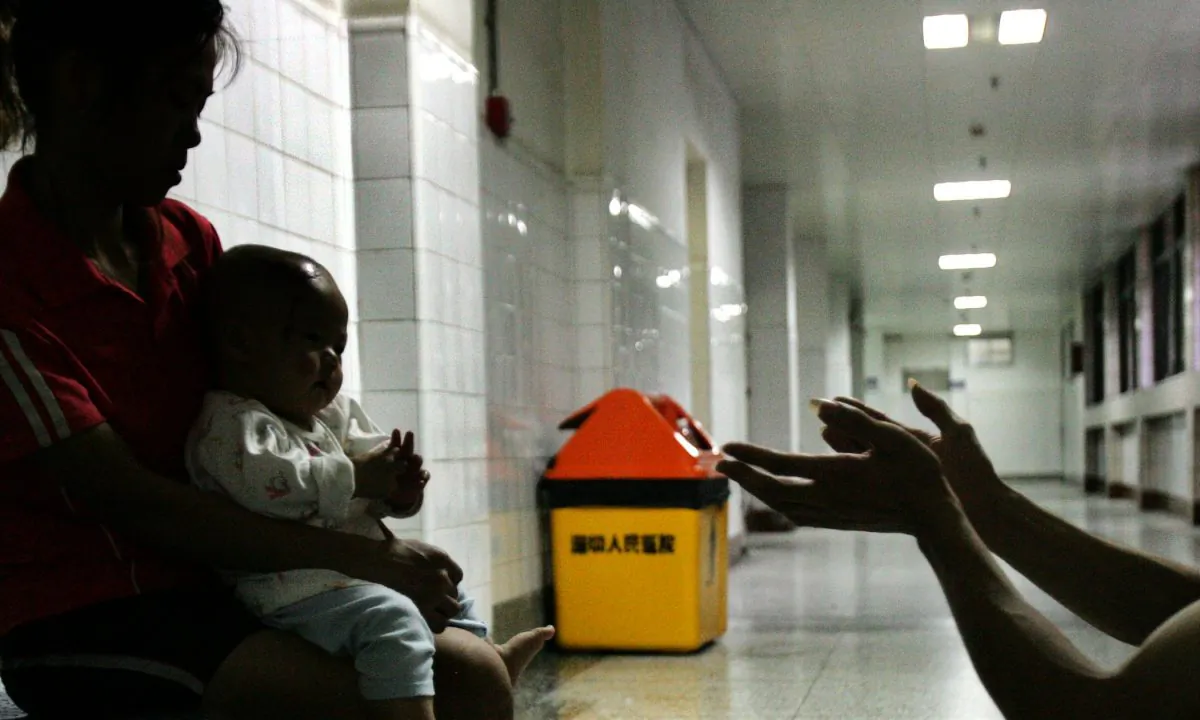 A family at a hospital in China. (China Photos/Getty Images)