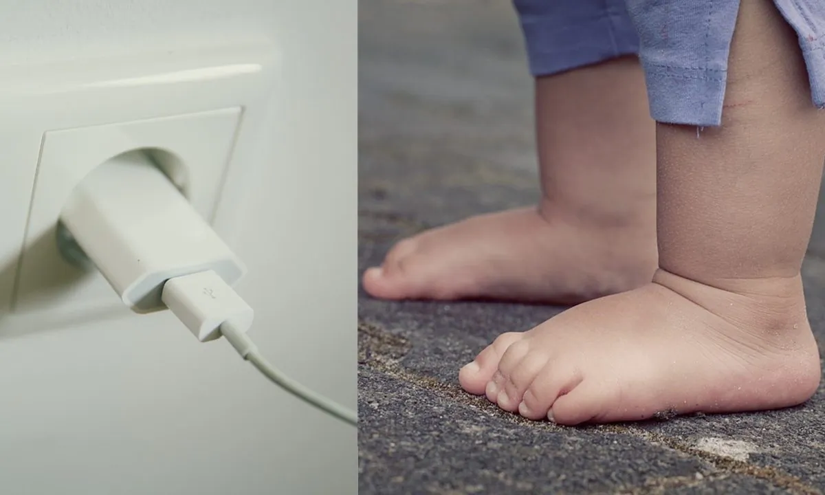 Stock image of a mobile charger and a toddler. (Pixabay)