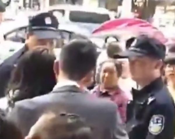 Woman slap crowd