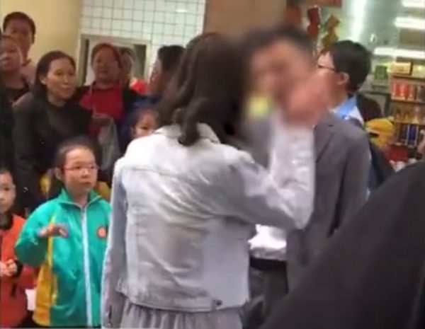 Woman slap crowd