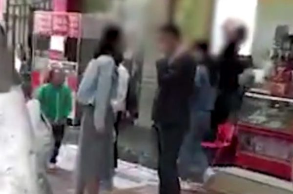 Woman slap crowd