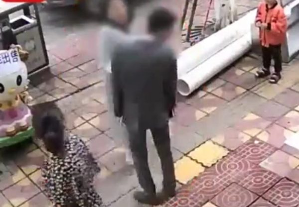 Woman slap crowd