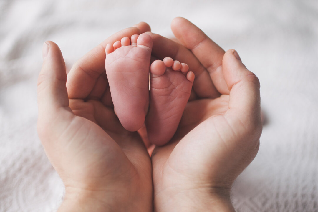 Australian researchers have developed a cheaper and less invasive alternative to traditional fertility treatments that is now available at Sydney's Royal Hospital for women. A stock photo of a baby and mother. (Illustration - Shutterstock)