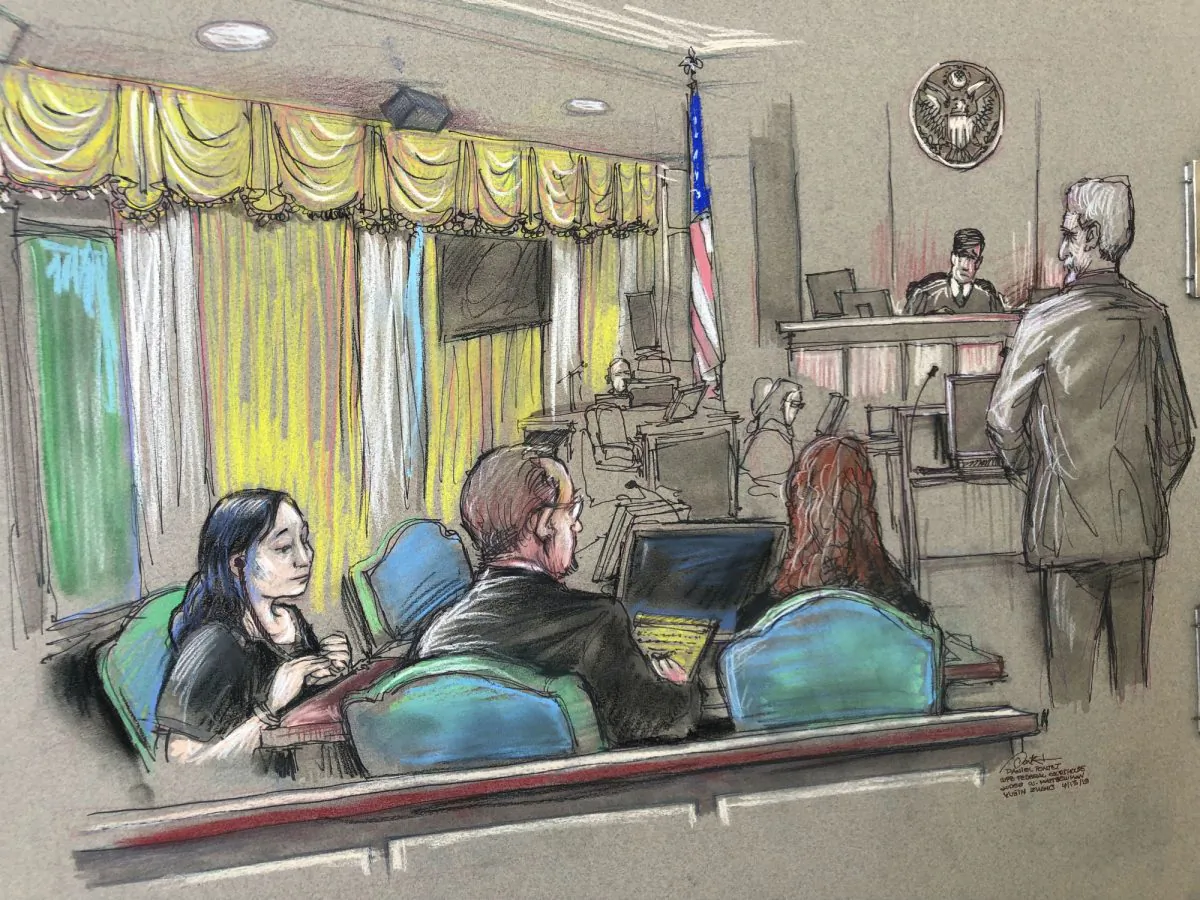 In this April 15, 2019 file court sketch, Yujing Zhang, left, a Chinese woman charged with lying to illegally enter President Donald Trump's Mar-a-Lago club, listens to a hearing Monday, April 15, 2019, before Magistrate Judge William Matthewman in West Palm Beach, Florda. (Daniel Pontet via AP, File)
