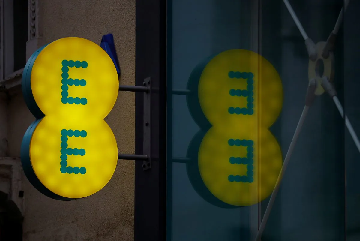 Signage is seen outside an EE mobile phone shop in Manchester, Britain on Sept. 21, 2017. (Phil Noble/Reuters)