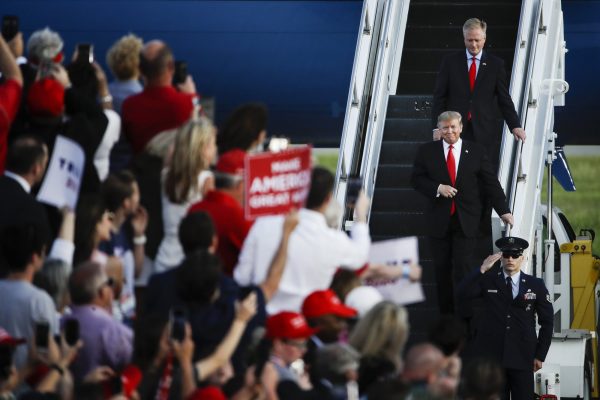 President Donald Trump accompanied by Rep. Fred Keller,