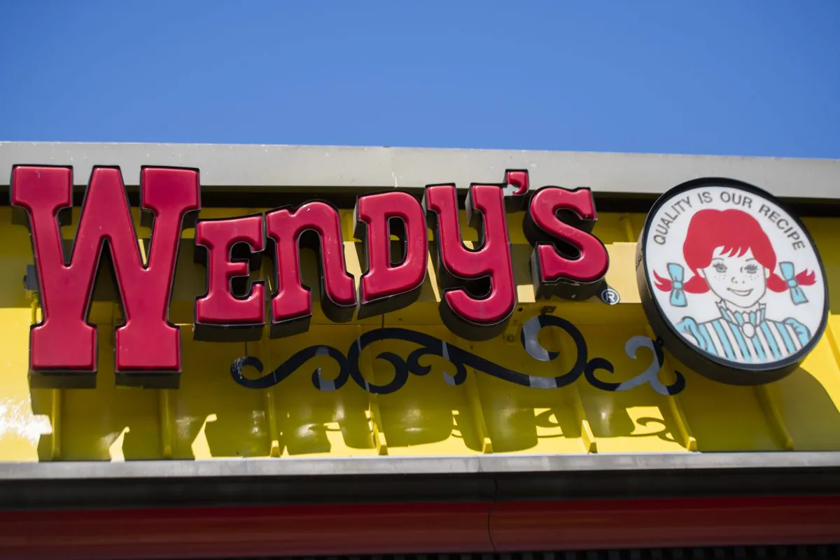 In this file image, a Wendy's sign is seen outside their restaurant in Bowie, Maryland on May 9, 2017. (Jim Watson/AFP/Getty Images)