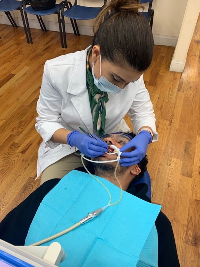 Dr. Chowdhury with a patient