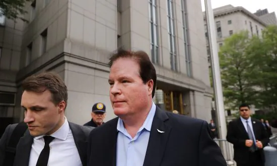 Prosecutors Charge Bank Ex-CEO With Soliciting White House Position in Exchange for $16 Million in Loans